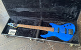 Blue finish Guild Pilot five string bass, with black hardware and rosewood fretboard, and black headstock