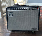 Music Man 112 RD One Hundred amplifier, black tole, grey grill cloth , black control panel, nine control knobs