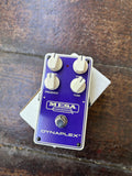 Purple Mesa Boogie Dyaplex effects pedcal, four white control knobs, single button switch