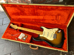 1992 Fender Stratocastr two twon sunburst, with white pick guard and maple neck and headstock