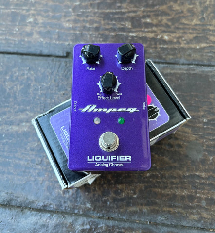 Ampeg Liquifier Analog Chorus purple guitar effects pedal with three knob controls and single button metal footswitch 