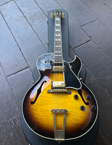 2011 Gibson Custom Shop ES-175 sunburst hollow-body with gold hardware and rosewood fretboard block pearl inlays and black headstock