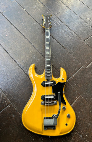 Yellow finish 1967 Teisco DG-67, two pick ups, rosewood neck, block inlays, brown headstock