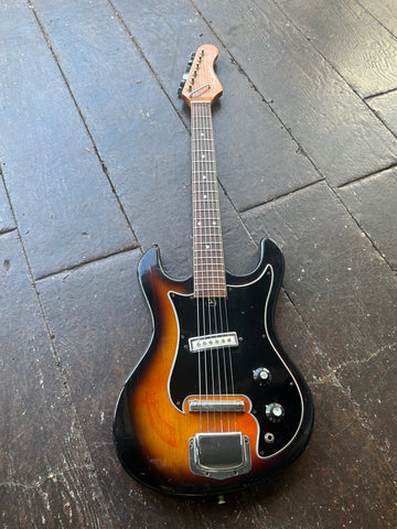 60's Teisco Model 319-14059 sunburst with black pick guard, rosewood neck, mahogany headstock