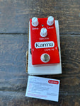 Karma ODR-10 Overdrive red guitar pedal with three control knobs and single button foot switch