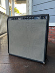 1964 Fender Concert black tolex and grey grill cloth, with black control panel eight control knobs