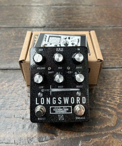 Electronic Audio Experiments Longsword black sparkle pedal with six control knobs, and two button foot switch