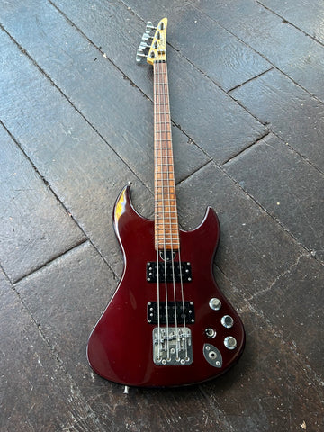 989 Fury Anthem Bass Burgundy finish, black pick ups, chrome hardware and rosewood fretboard and maple headstock