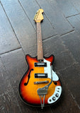 60's Teisco Prestige, sunburst with two pick ups, chrome hardware, rosewood fret board and maple headstock
