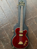 Full shot of Epiphone Allen Woody Rumblekat Bass atop hardshell case