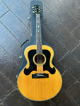 Morris acoustic guitar, spruce top with black pick-guards and rosewood fretboard with star inlays and black headstock