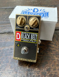 Daredevil British Black Belt guitar pedal in black and gold , two control knobs, with single button foot switch