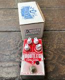 Daredevil Bootleg Dirty Delay red guitar pedal with four knob controls, single button foot switch