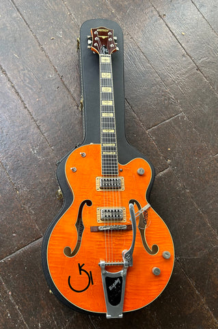 Orange finish Gretsch hollow-body, arch-top, with bigbsy, signature model Reverent Horton Hear, rosewood fretboard with brown headstock