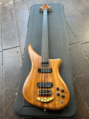 Alembic Epic Bass walnut finish, gold hardware, black pick ups, rosewood neck with walnut headstock