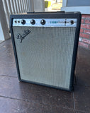 1981 Fender Champ in Musicmaster Bass Cab with black tolex, grey grill cloth and silver panel control panel with three control knobs