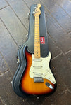 Sunburst fender stratocaster with white pickguard, metal tremolo, maple fret board, black inlay dots, fender maple headstock