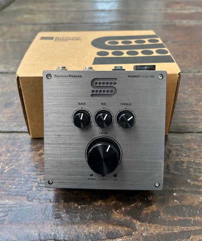 Seymour Duncan Power Stage 170  effects pedal , grey metal with three black control knobs and single large level knob