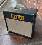 Dark navy blue Hop Hat amplifier with tan grill cloth, Top hat gold badge 