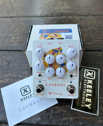 Keeley Caverns Delay Reverb V2 Delay Reverb white pedal with eight white knob controls and two button metal footswitch 