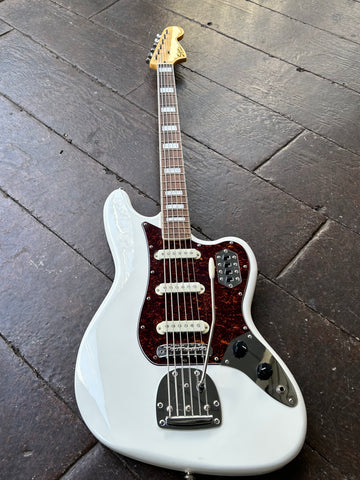 Squier Vintage Modified Bass VI with white finish , tortoise  pick guard  Pau Ferro fret board and maple headstock 