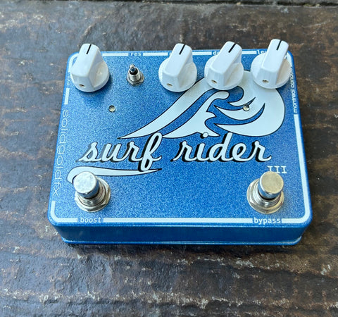 SolidGoldFX Surf Rider III Reverb Effects guitar pedal, sparkle blue, four white knob controls and two button footswitch controls