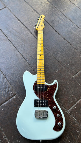 G&L Fallout Tribute Series Sonic Blue electric guitar with tortoise pick guard, black pick-ups , maple neck and headstock