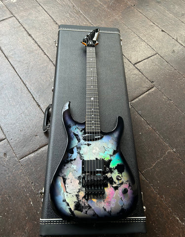 Badlands Guitar Co. GX1 Holoflash, muticolor finish top, with black hardware and pick-ups and ebony neck with black headstock