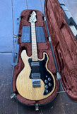 Ash peavey T-0 electric guitar with ash body, maple neck and headstock with black pick-ups and pick guard