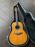 top view Ovation spruce top with rosewood bridge, ebony fret board with diamond fret markers , rosewood headstock, gold tuners,in case