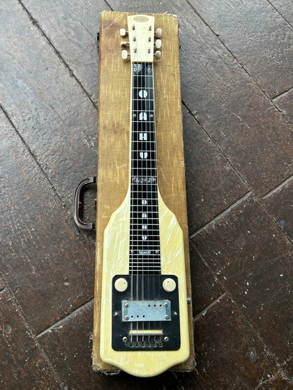 Oahu Lap Steel Supreme Oahu Supreme Mid 1950’s  Cream mother of pearl, black plastic fretboard and moth of pear headstock