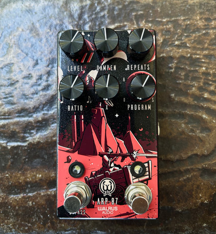 Red and black Walrus Audio delay pedal, with six control knobs, two button metal footswitch