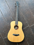 Spruce top Taylor Guitar with ebony fretboard with dot inlays, black headstock