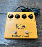 Orange Ross Stereo Delay R80, with four black control knobs, two button footswitch